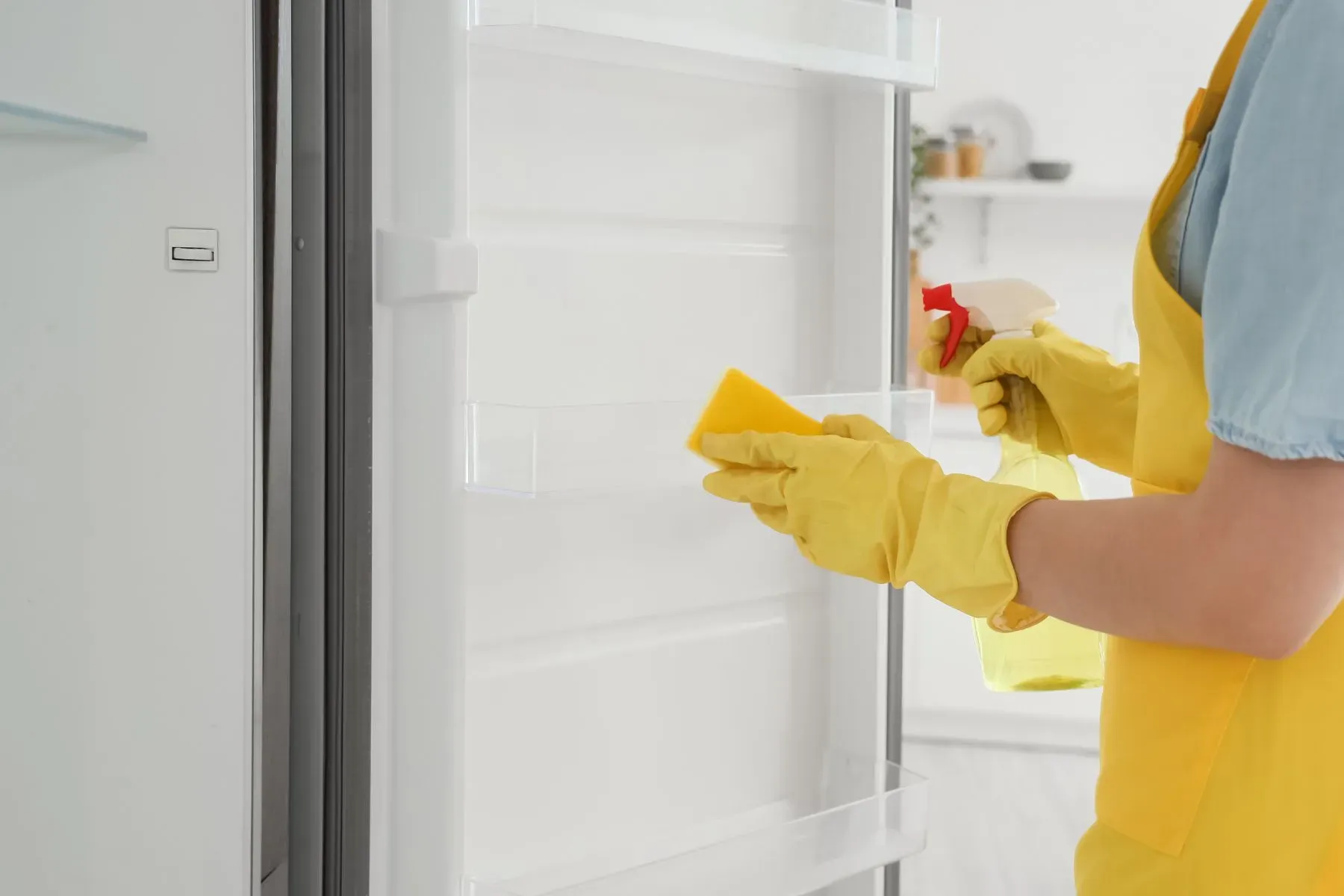 Cleaning refrigerator condenser coils